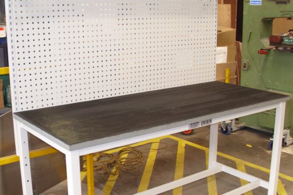 Assembly Bench with Perforated Storage Panel